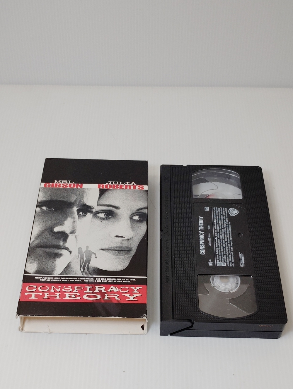 12 For $8 Conspiracy Theory VHS Tape with Sleeve - Black and White
